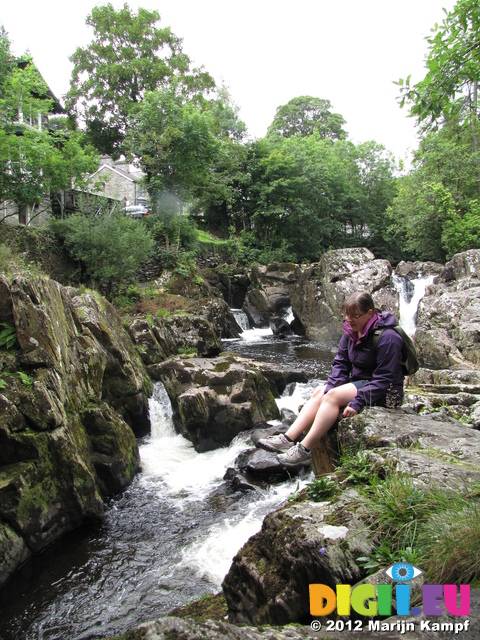 SX23132 Jenni on rocks by Afon Conwy at Betws-Y-Coed